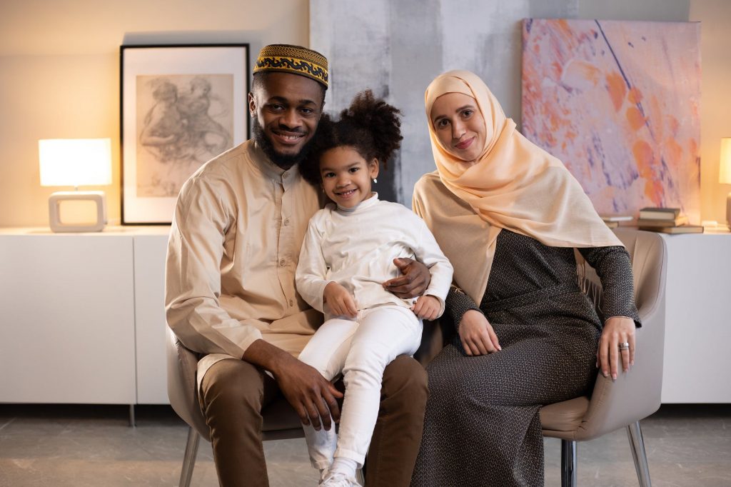 Photo of a family featuring a mother, father and daughter, illustrating Absolute Translation's blog on language technology and its positive impact for migrants